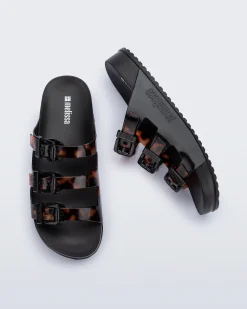 Slides*Melissa Cozy Stripes Black/Clear Tortoise